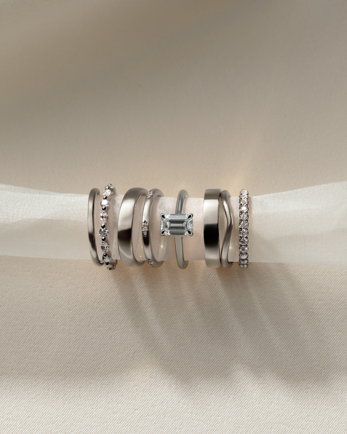 Jane - Emerald Claw Solitaire with Hidden Halo and Cathedral High Setting Engagement Ring - Platinum