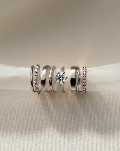 Daniela - Round Claw Solitaire with Solid Cathedral High Setting Engagement Ring - Platinum