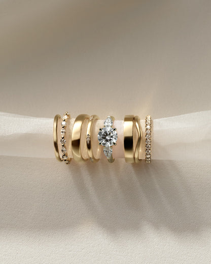 Halle - Round Claw Trilogy with Pear Side Stones and Knife Edge Band Engagement Ring - Yellow Gold