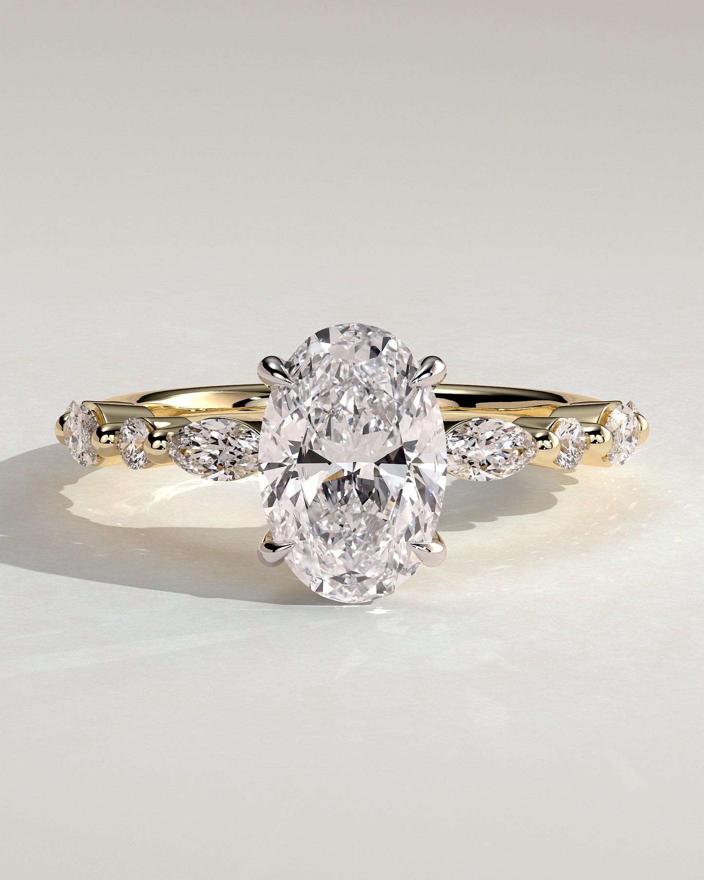 Alyssa - Oval Claw Solitaire with Marquise and Round Accent Stones Engagement Ring - Yellow Two-Tone - Yellow Two-Tone 2ct