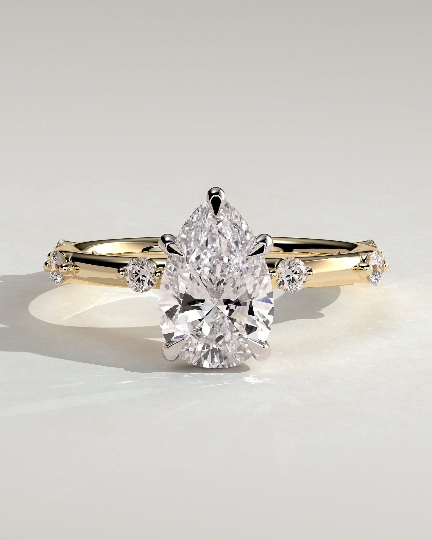 Amora - Pear Claw Solitaire with 6 Spaced Round Accent Stones and Hidden Halo Engagement Ring - Yellow Two-Tone - Yellow Two-Tone 2ct