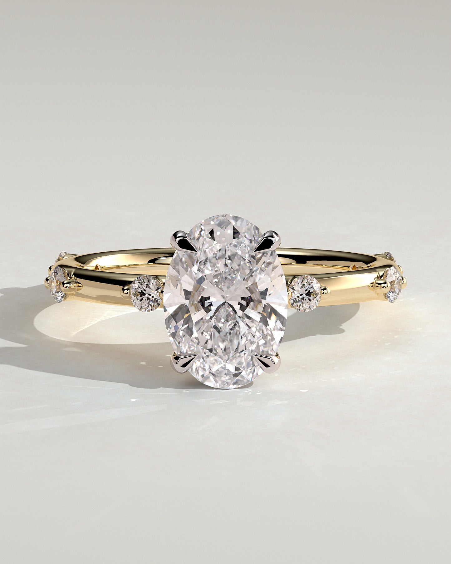Elise - Oval Claw Solitaire with 6 Spaced Round Accent Stones and Hidden Halo Engagement Ring - Yellow Two-Tone - Yellow Two-Tone 2ct