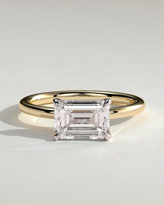 Debbie - Emerald East West Claw Solitaire Engagement Ring - Yellow Two-Tone