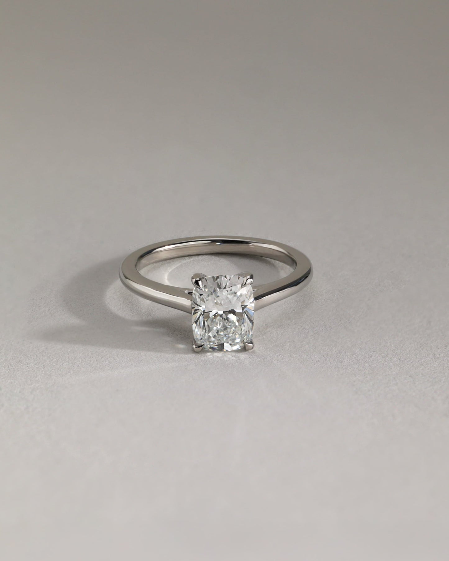 Kelsey - Elongated Cushion Claw Solitaire with Cathedral Low Setting and Open Trellis Gallery Engagement Ring - Rose Gold