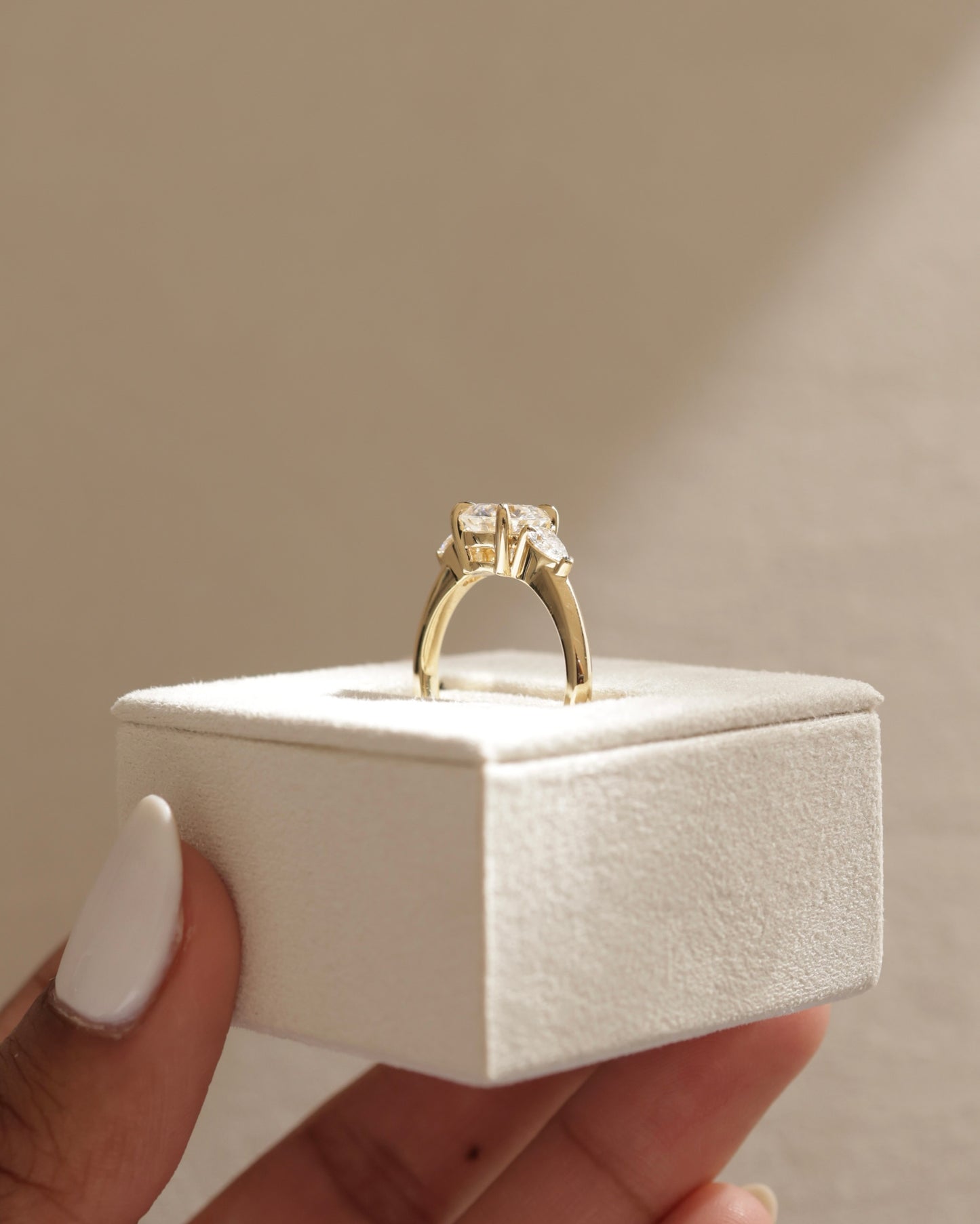 Halle - Round Claw Trilogy with Pear Side Stones and Knife Edge Band Engagement Ring - Platinum - Lifestyle