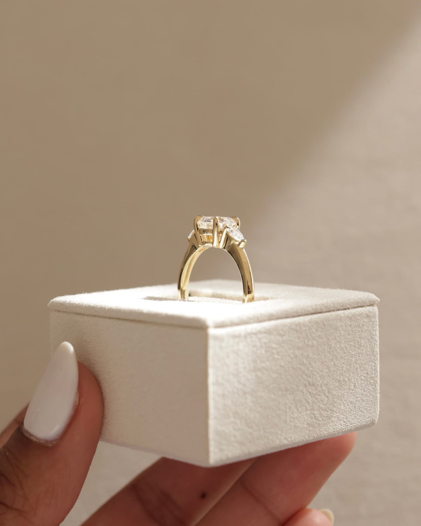Halle - Round Claw Trilogy with Pear Side Stones and Knife Edge Band Engagement Ring - Yellow Gold