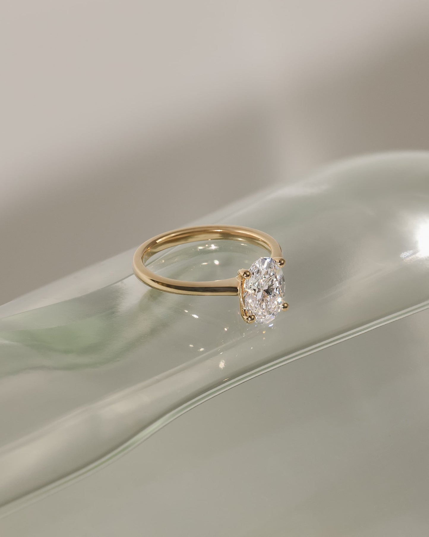 Emily - Oval Claw Solitaire with Pinched Tapered Band and Cathedral Low Setting Engagement Ring - Rose Gold
