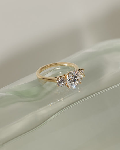 Octavia - Round Claw Trilogy with Round Side Stones and Trellis Gallery Engagement Ring - Platinum