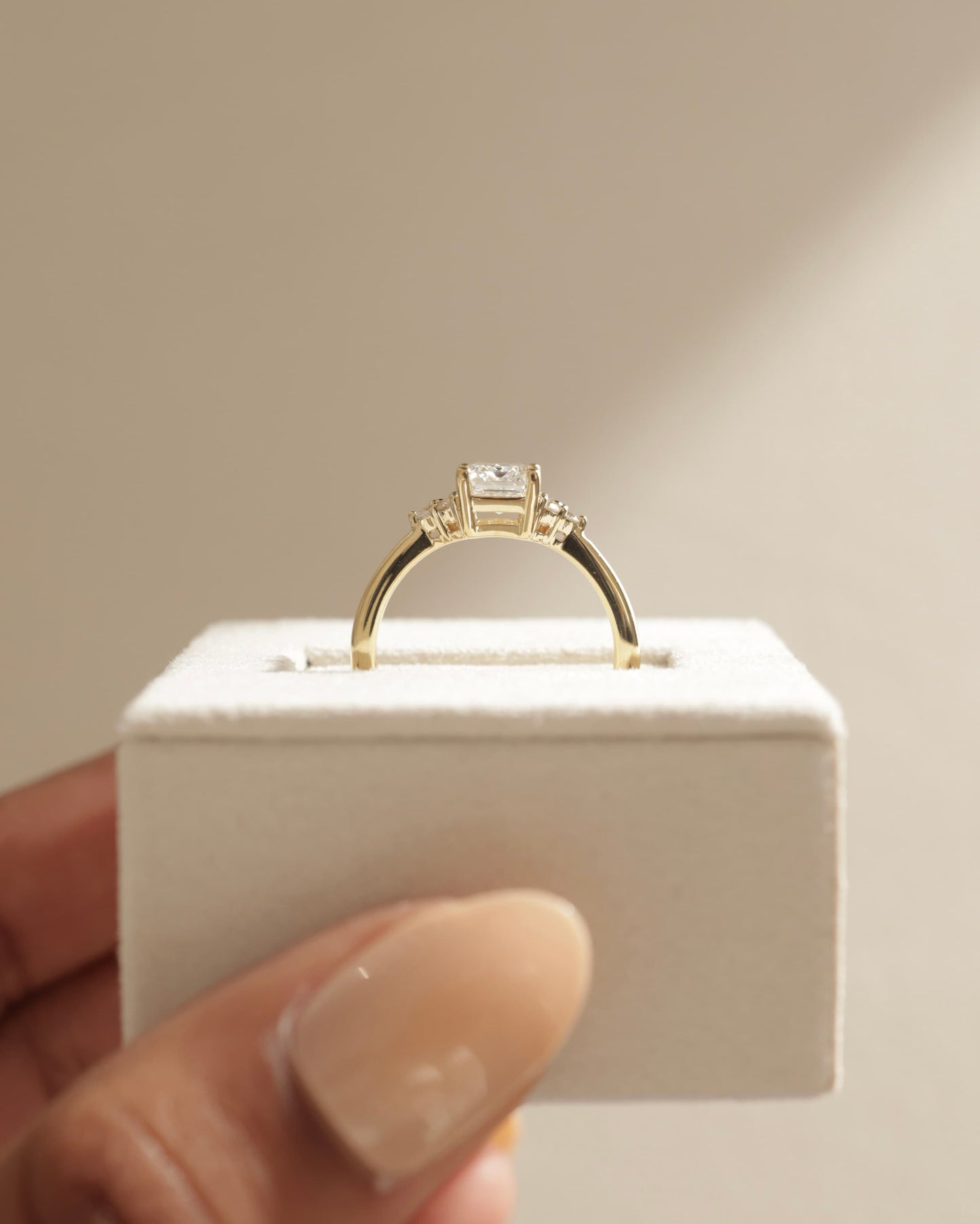 Martina - Emerald Claw Solitaire with Round Shoulder Stones Engagement Ring - Yellow Gold