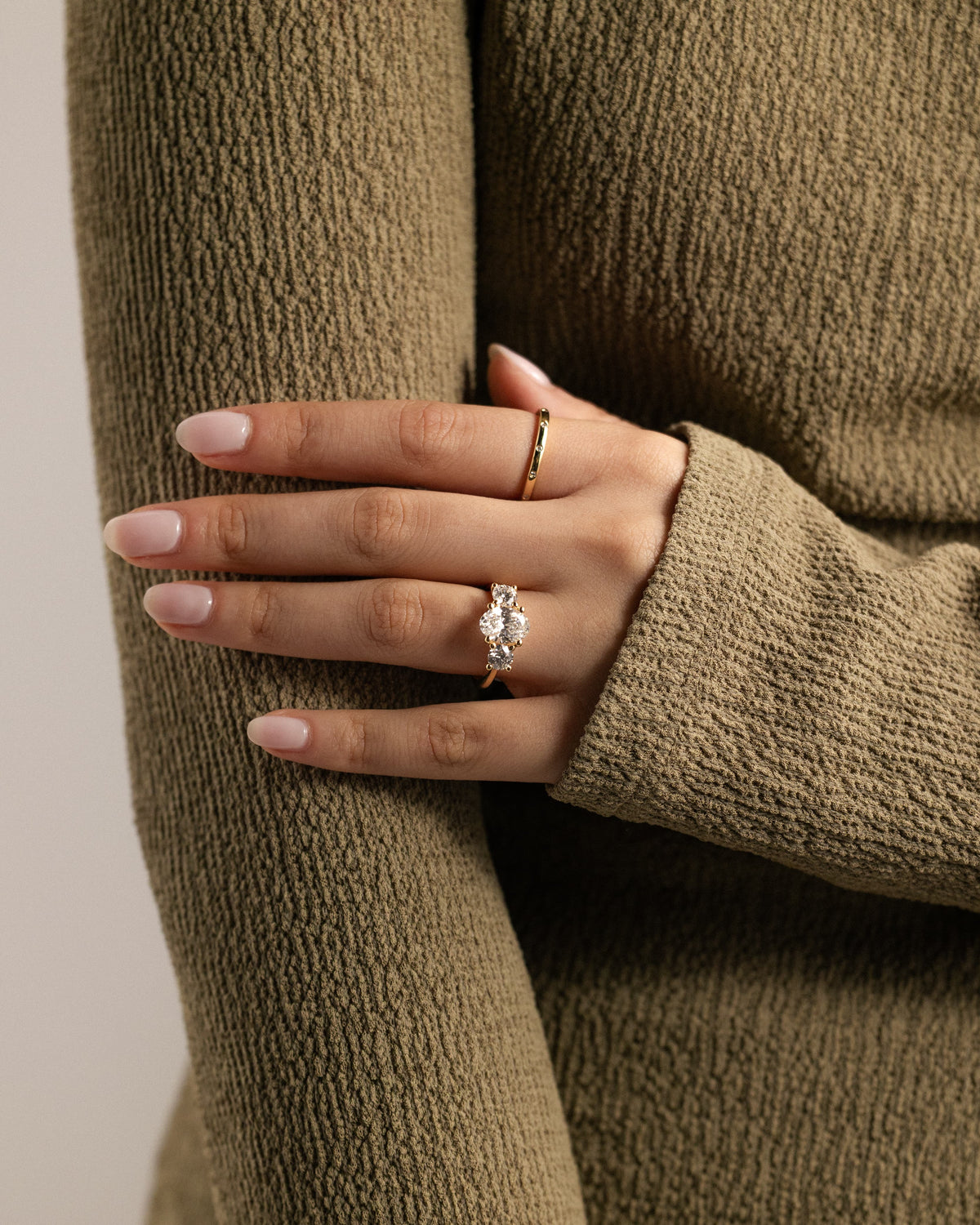 Grace - Oval Claw Trilogy with Round Side Stones, Open Trellis Gallery and Tapered Band Engagement Ring - Yellow Gold