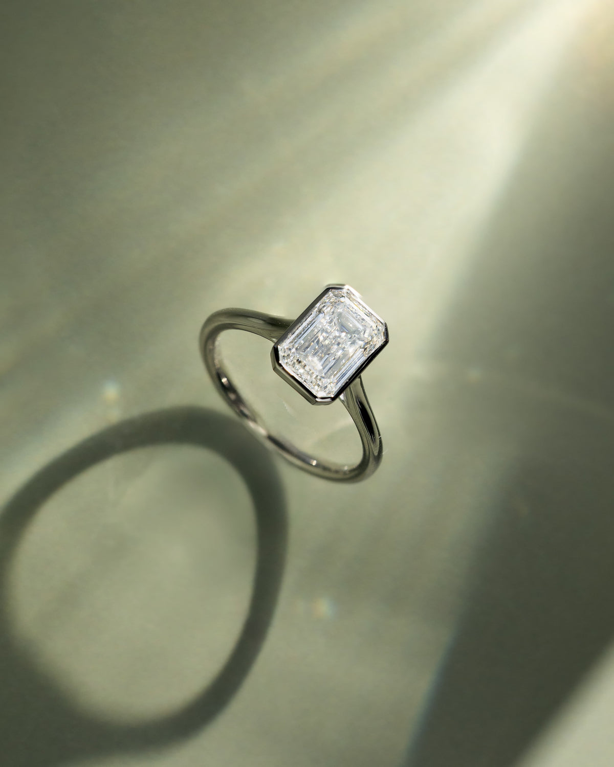 Imani - Emerald Bezel Solitaire with Cathedral High Setting Engagement Ring - Yellow Gold