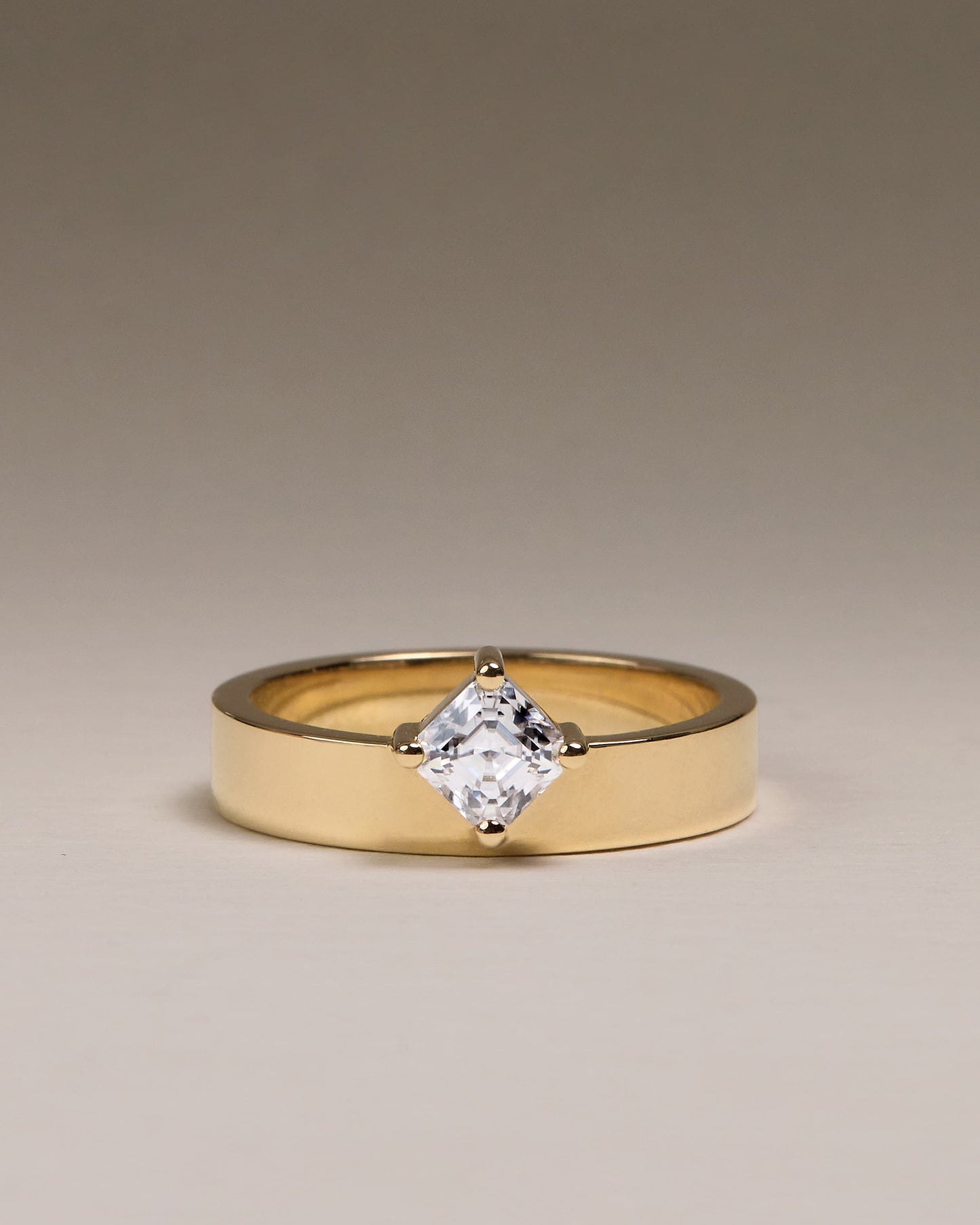 Vicki - Asscher Claw Solitaire with Offset Setting and Flat Cigar Band Engagement Ring - Yellow Gold