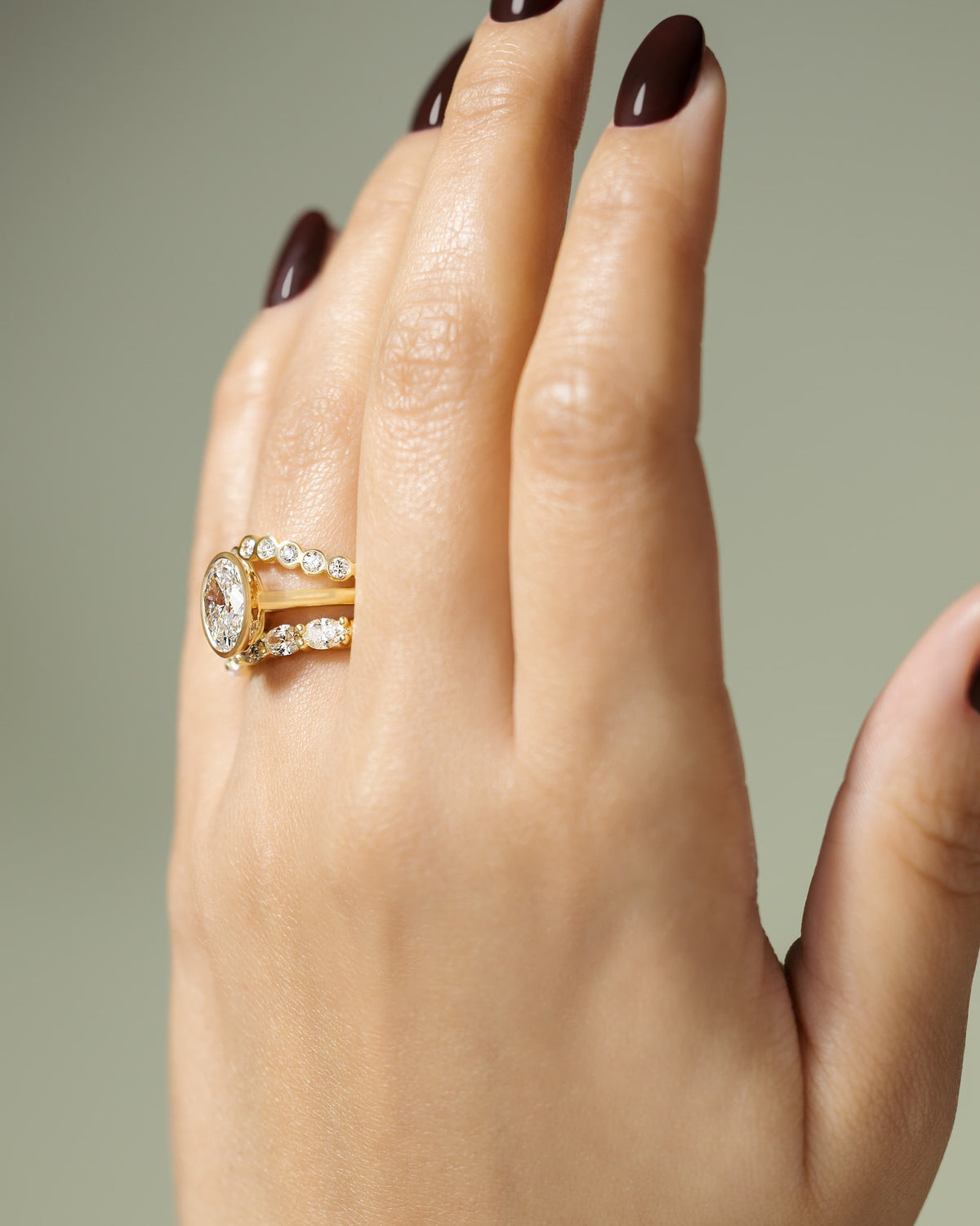 Gemma - Oval Bezel Solitaire with Twisted Gallery Engagement Ring - Yellow Gold