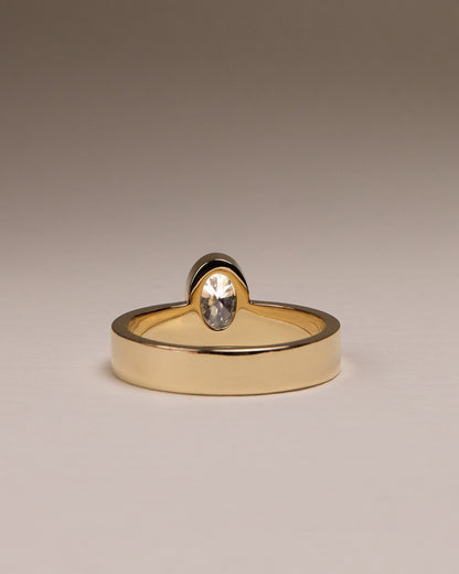 Carmen - Oval Bezel Solitaire with Offset Setting and Flat Cigar Band Engagement Ring - Yellow Gold