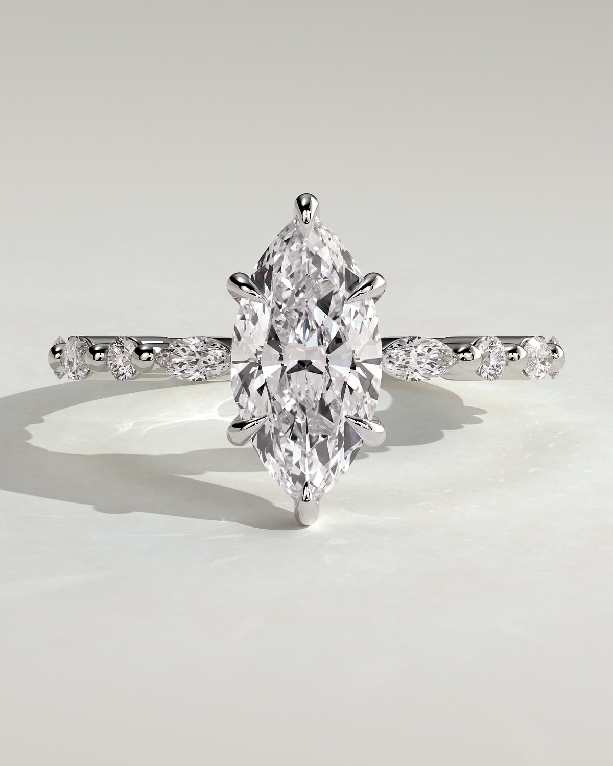 Beatrice - Marquise Claw Solitaire with Marquise and Round Accent Stones Engagement Ring - White Gold