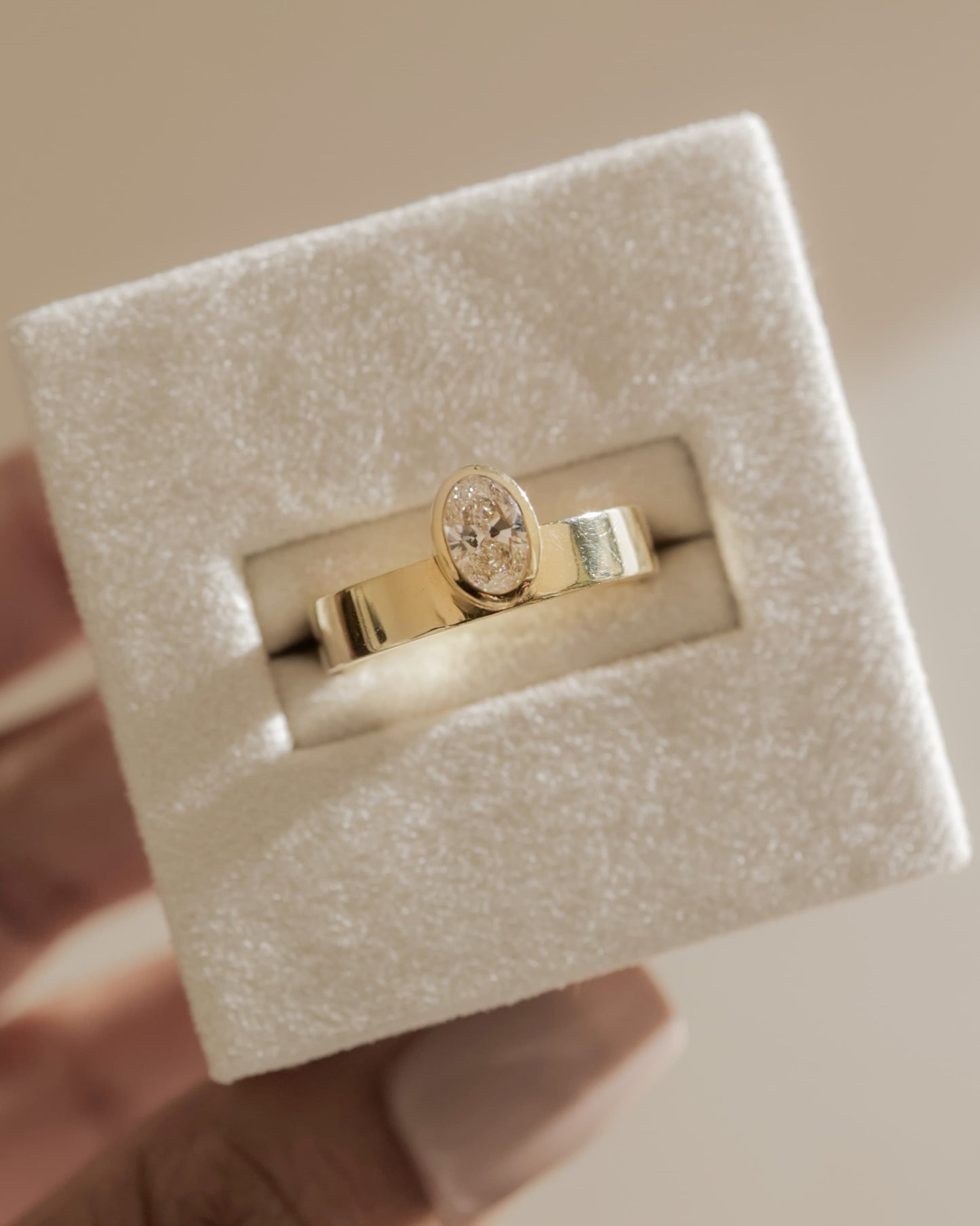 Carmen - Oval Bezel Solitaire with Offset Setting and Flat Cigar Band Engagement Ring - White Gold