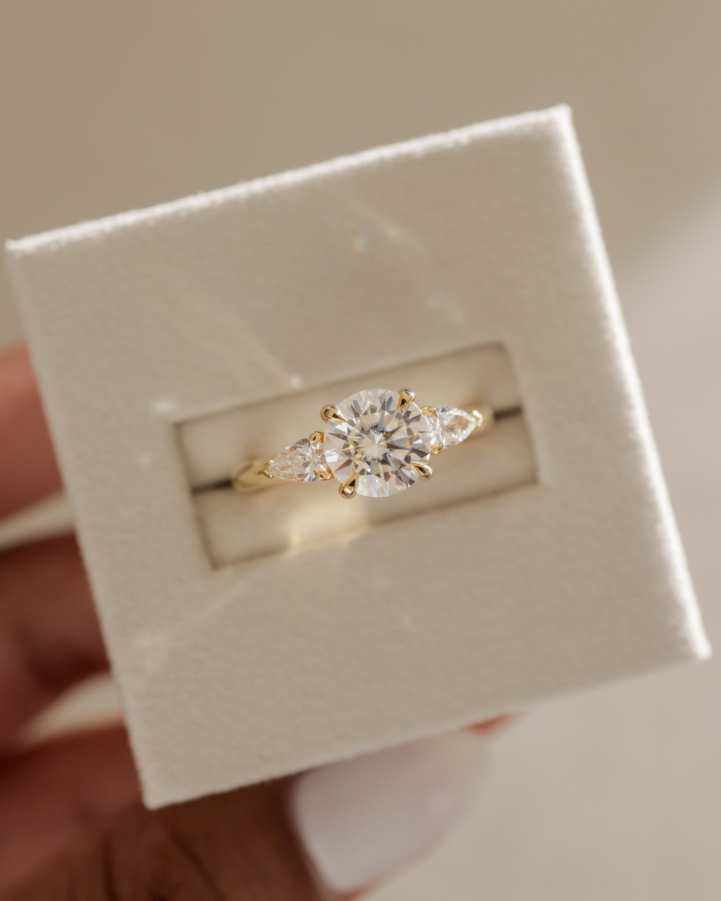 Halle - Round Claw Trilogy with Pear Side Stones and Knife Edge Band Engagement Ring - Platinum - Lifestyle