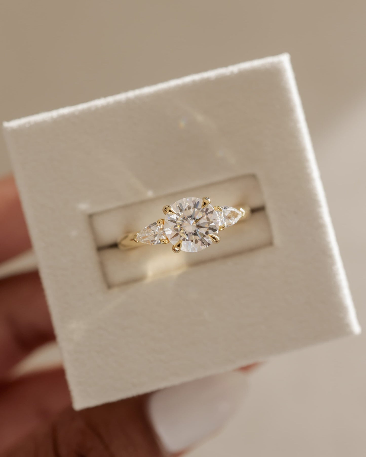 Halle - Round Claw Trilogy with Pear Side Stones and Knife Edge Band Engagement Ring - Yellow Gold