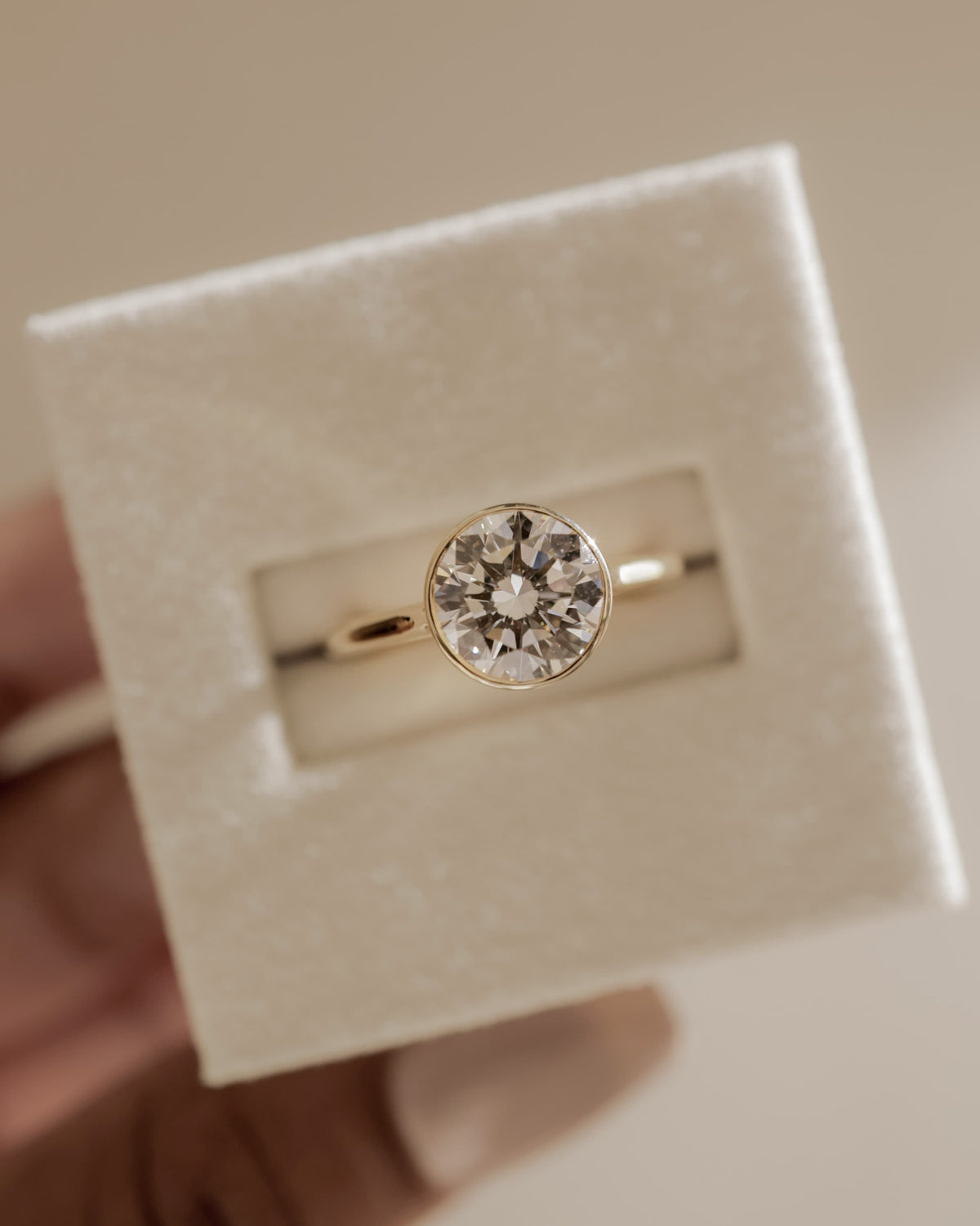 Maeve - Round Bezel Solitaire with Twisted Gallery Engagement Ring - Platinum