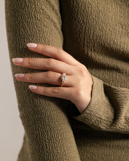 Octavia - Round Claw Trilogy with Round Side Stones and Trellis Gallery Engagement Ring - Rose Gold
