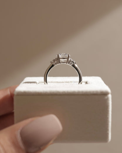 Greta - Round Claw Solitaire with Round Shoulder Stones Engagement Ring - Platinum
