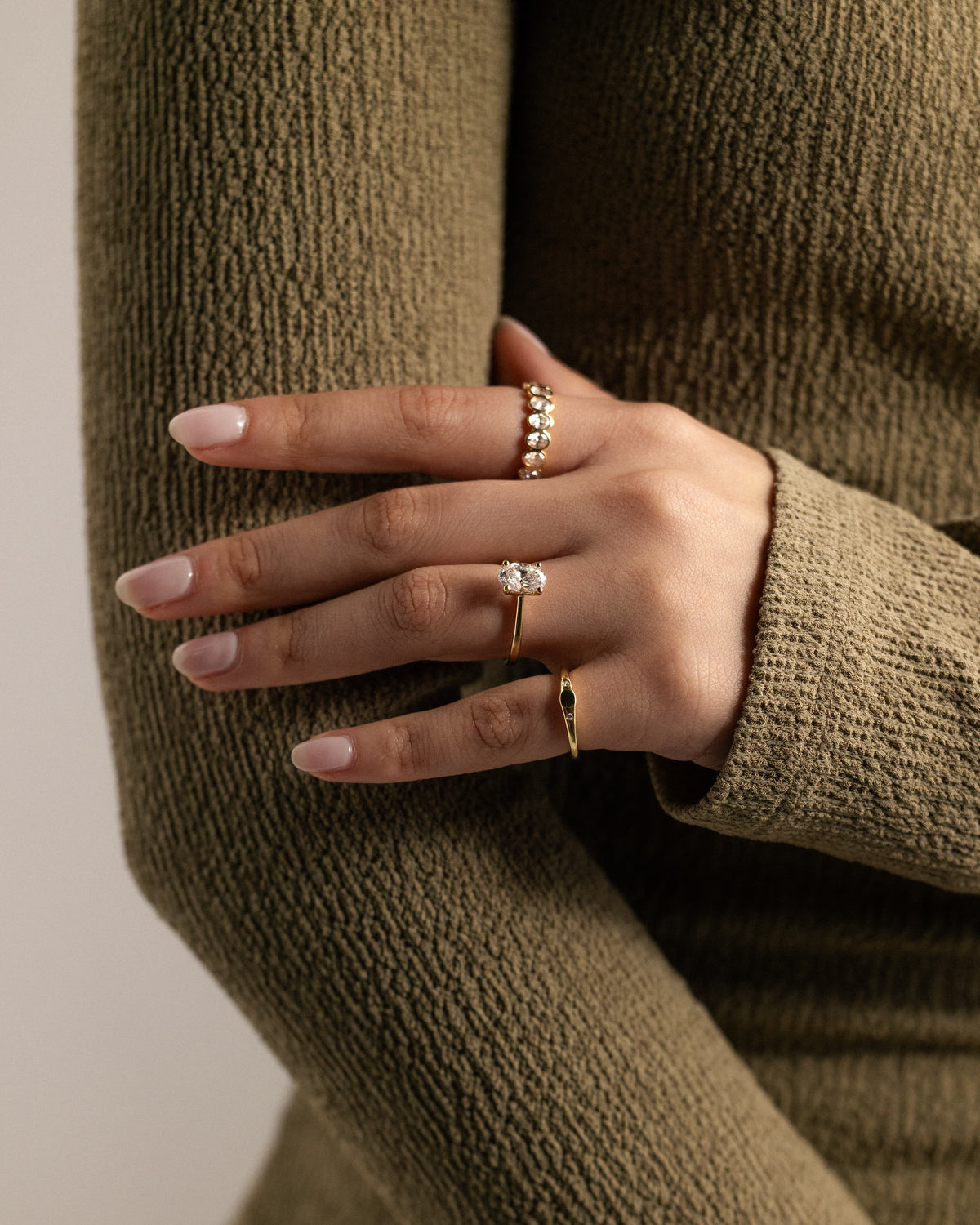 Emily - Oval Claw Solitaire with Pinched Tapered Band and Cathedral Low Setting Engagement Ring - Yellow Gold