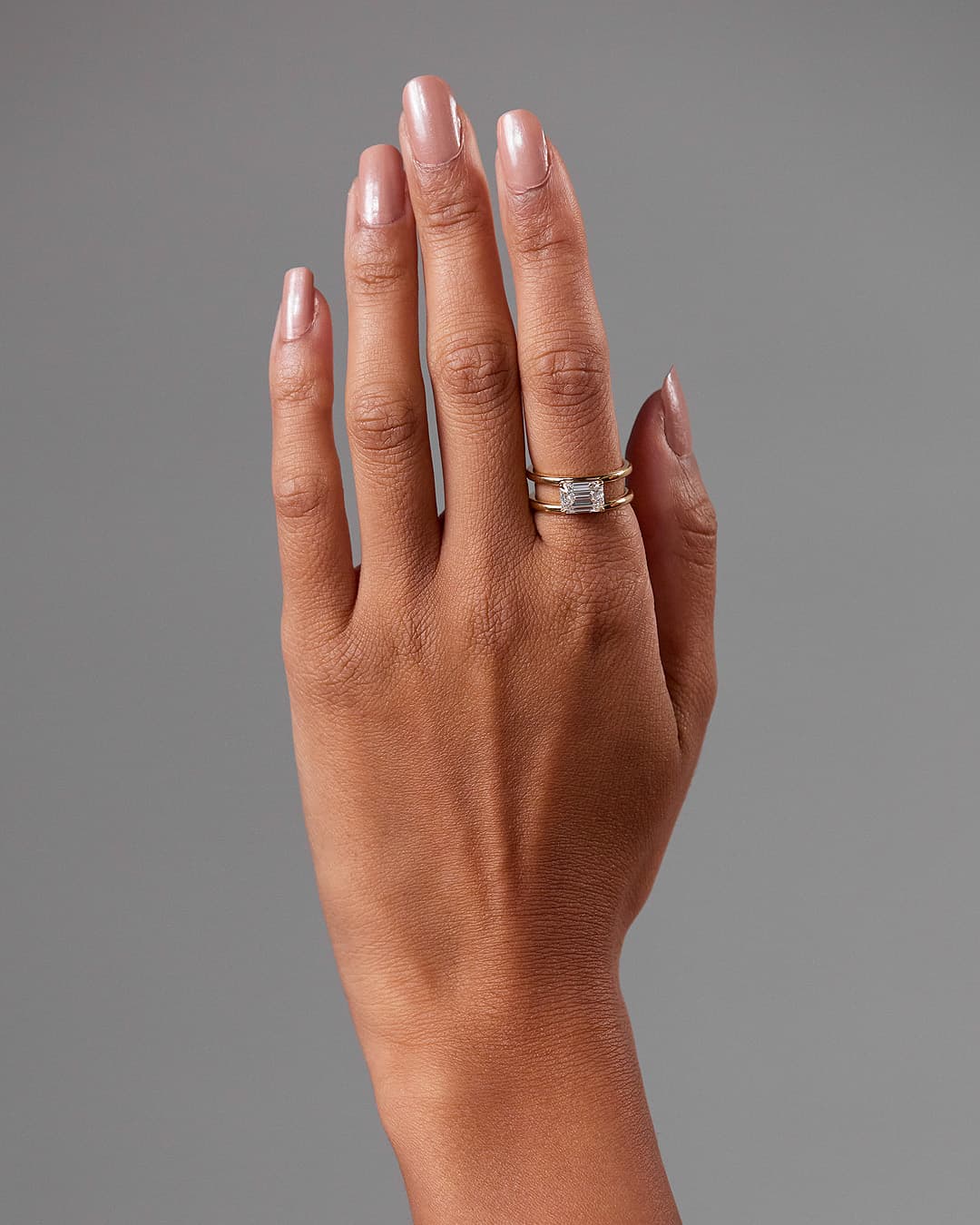 Devon - Emerald East West Claw Solitaire with Spaced Double Band Engagement Ring - Yellow Gold