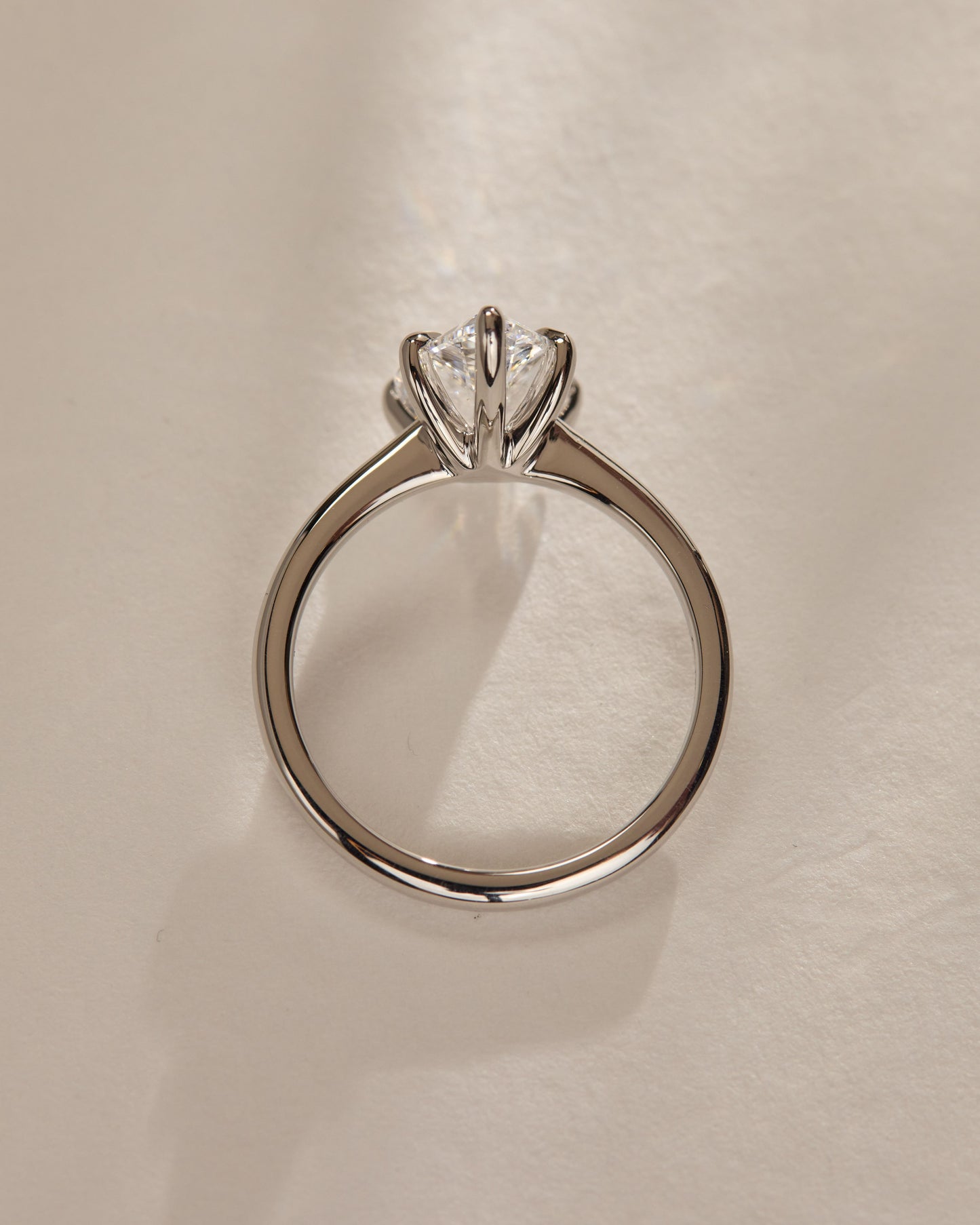 Aspen - Pear Claw Solitaire with Pinched Tapered Band and Cathedral Low Setting Engagement Ring - Platinum - Lifestyle