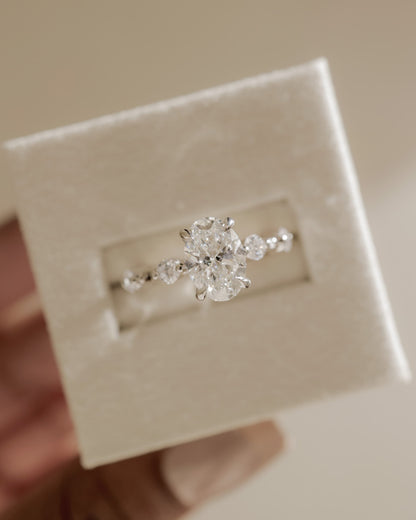 Arwen - Oval Claw Solitaire with 4 Spaced Round Accent Stones and Hidden Halo Engagement Ring - Rose Gold