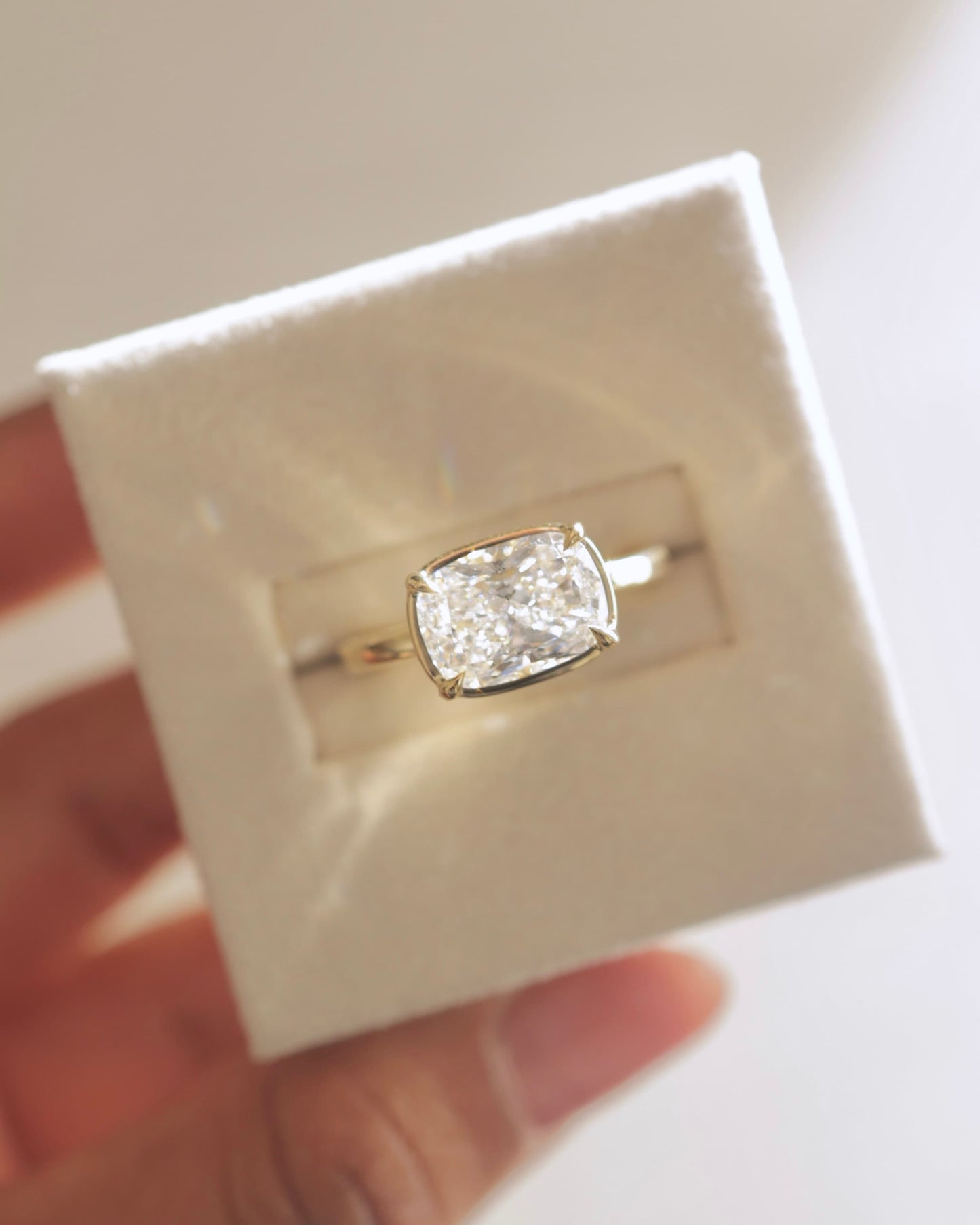 Daya - Elongated Cushion East West Claw Solitaire with Bezel Frame Engagement Ring - Yellow Gold