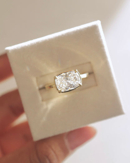 Daya - Elongated Cushion East West Claw Solitaire with Bezel Frame Engagement Ring - Yellow Gold