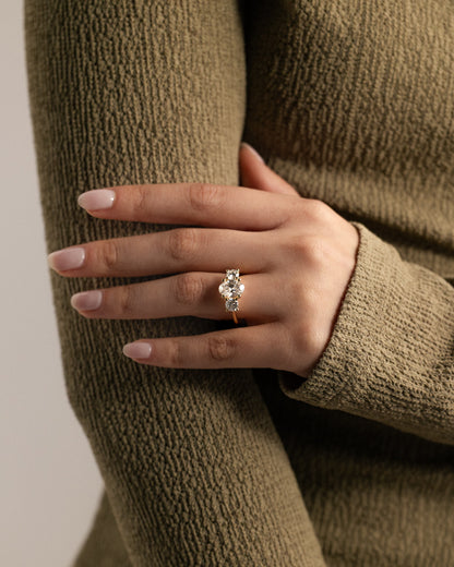 Grace - Oval Claw Trilogy with Round Side Stones, Open Trellis Gallery and Tapered Band Engagement Ring - Yellow Gold