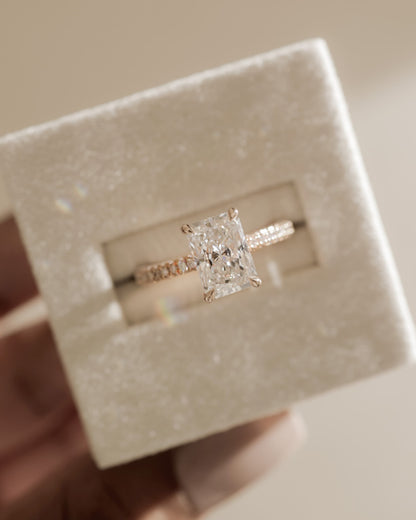 Irene - Radiant Claw Solitaire with Hidden Halo and Triple Pave Band Engagement Ring - Platinum