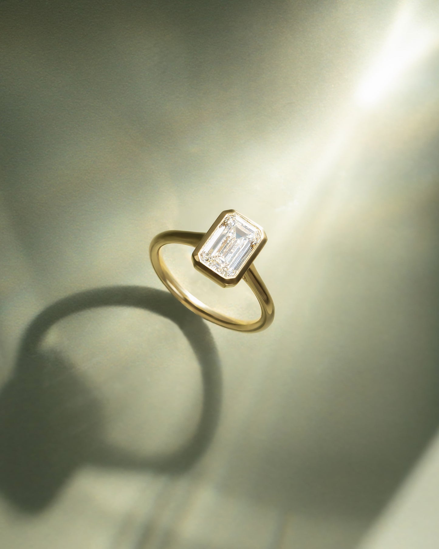 Journee - Statement Emerald Bezel Solitaire with Open Cathedral High Setting Engagement Ring - Yellow Gold