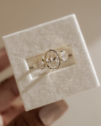 Zelda - Oval Bezel Trilogy Engagement Ring - Yellow Gold