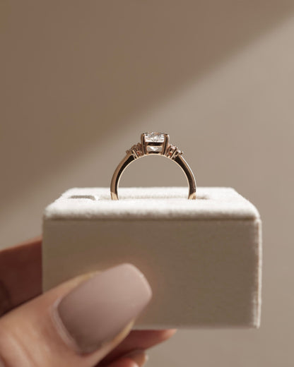 Lena - Cushion Claw Solitaire with Round Shoulder Stones Engagement Ring - Yellow Gold