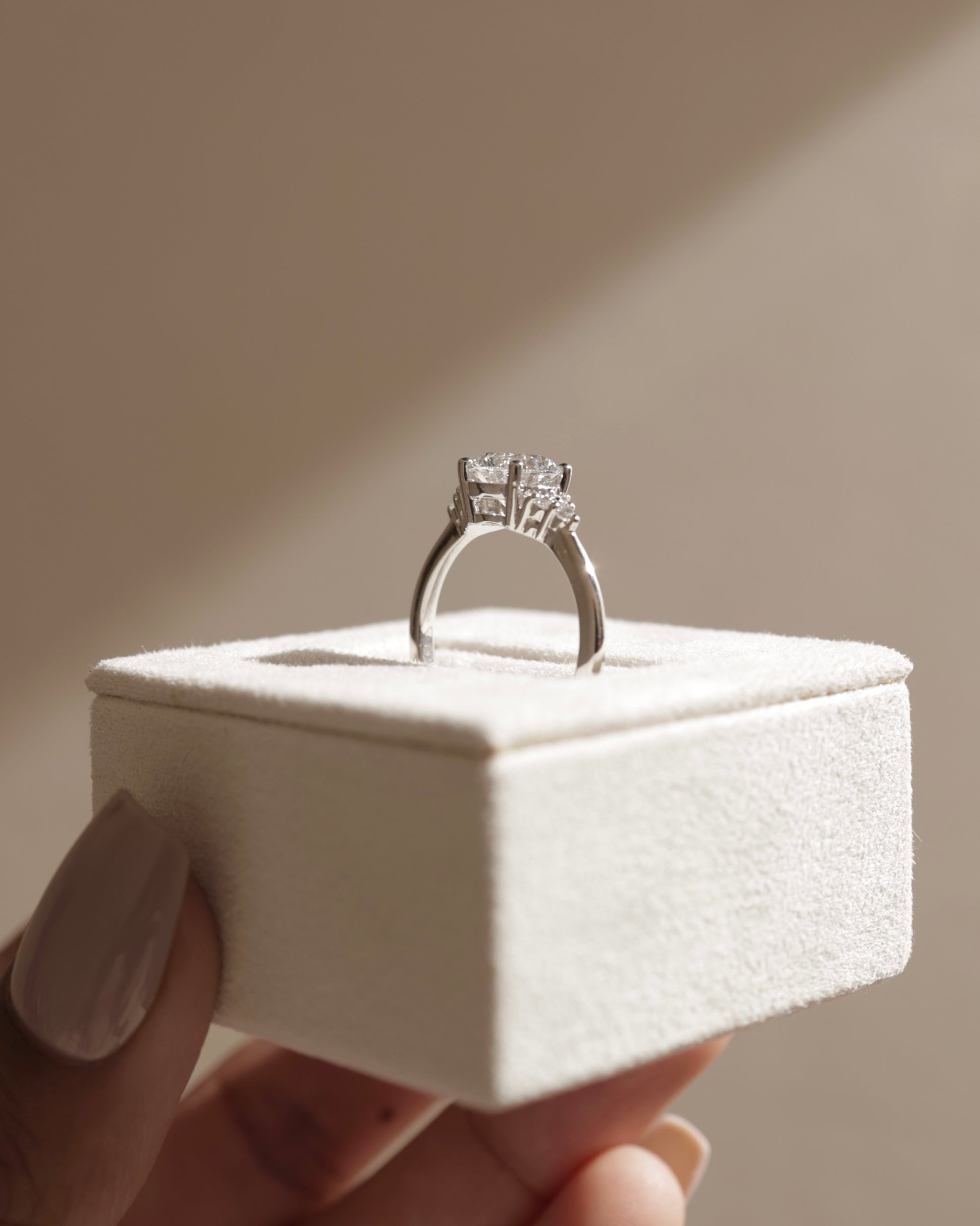 Greta - Round Claw Solitaire with Round Shoulder Stones Engagement Ring - Platinum - Lifestyle