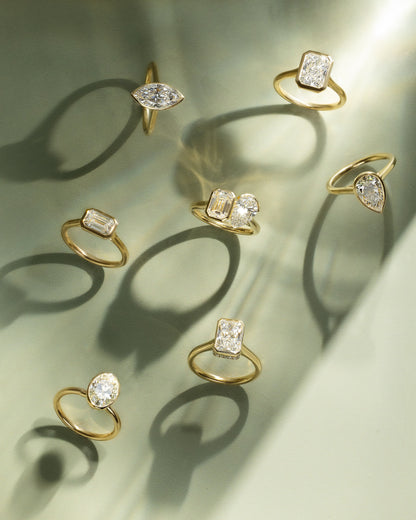 Olive - Statement Emerald East West Bezel Solitaire with Open Cathedral High Setting Engagement Ring - Rose Gold