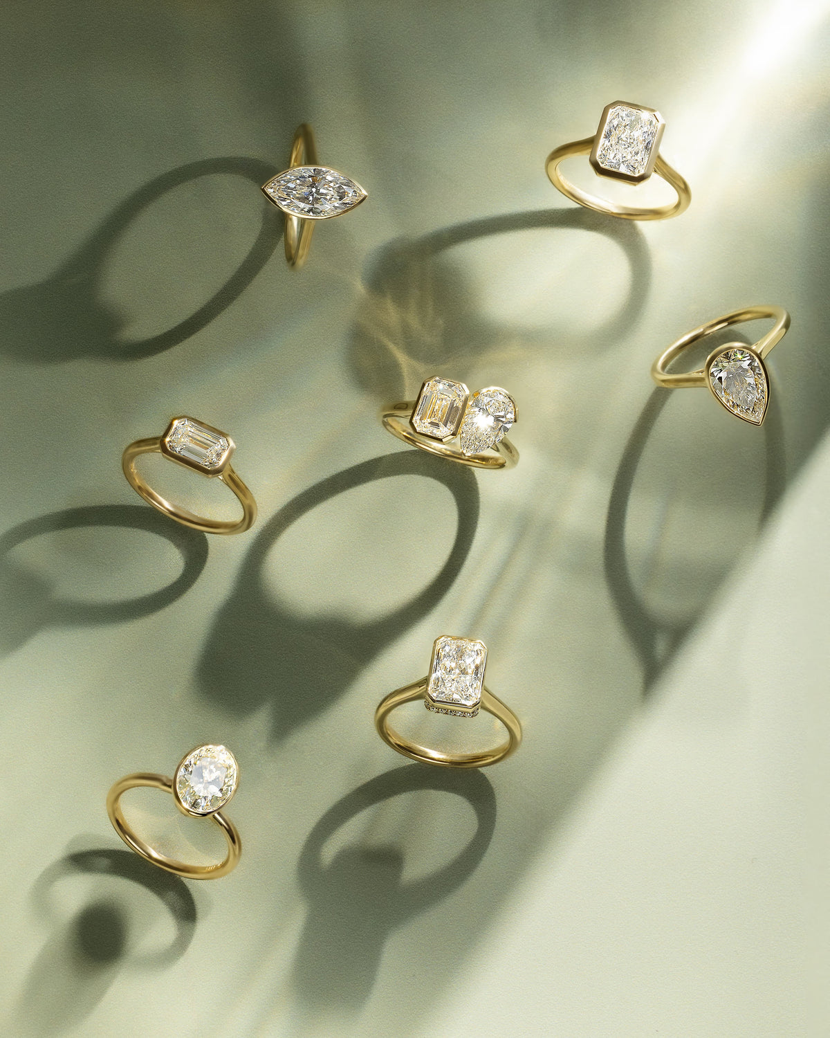 Olive - Statement Emerald East West Bezel Solitaire with Open Cathedral High Setting Engagement Ring - White Gold