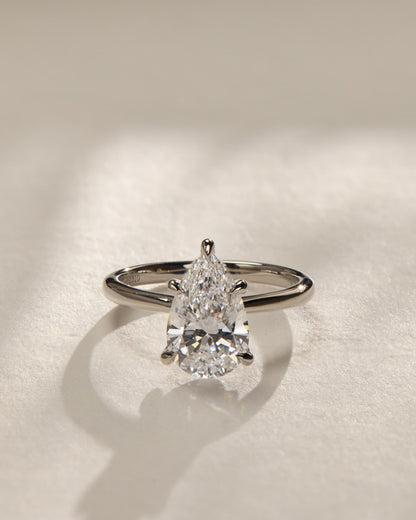 Aspen - Pear Claw Solitaire with Pinched Tapered Band and Cathedral Low Setting Engagement Ring - Yellow Gold