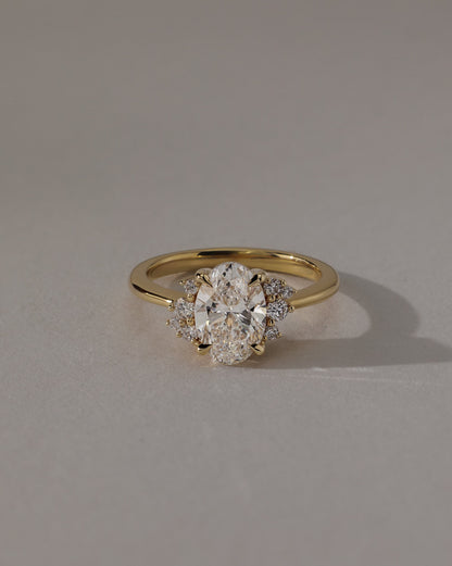Esther - Oval Claw Solitaire with Clustered Round Opposing Shoulder Stones Engagement Ring - White Gold