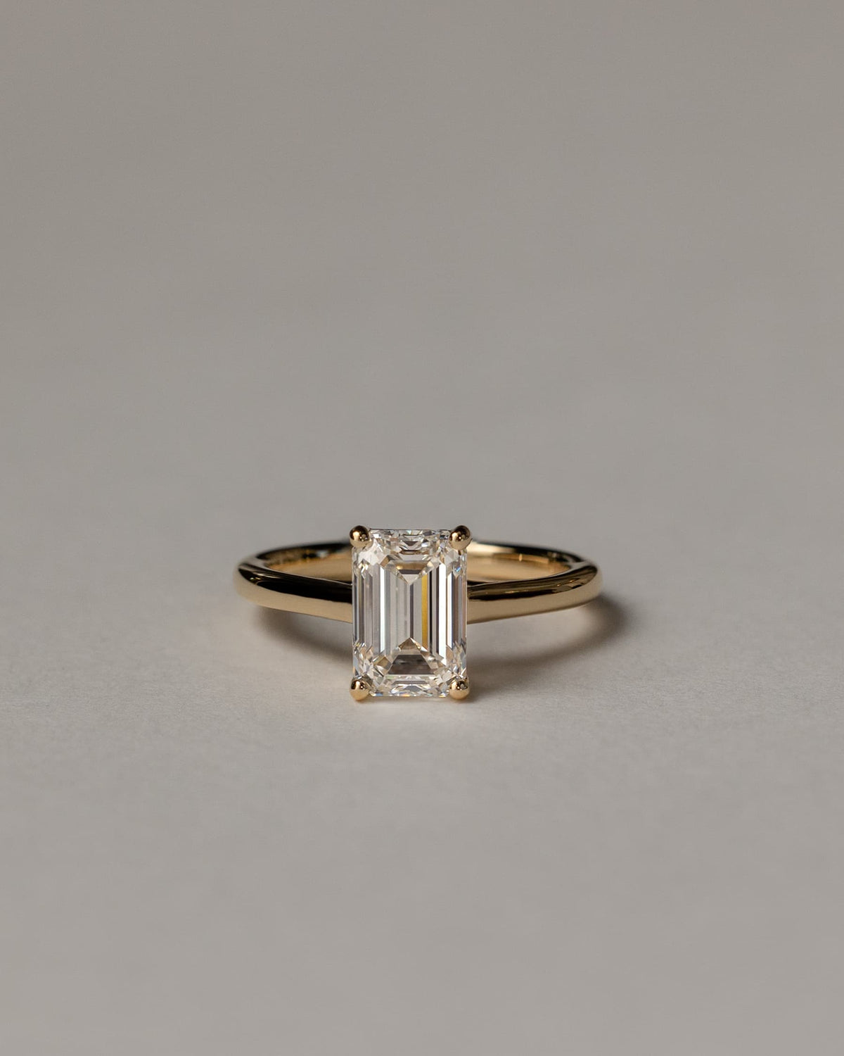 Nora - Emerald Claw Solitaire with Spiral Gallery and Cathedral Low Setting Engagement Ring - Platinum