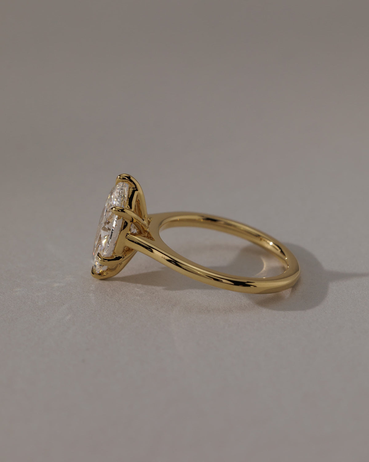 Leila - Marquise Claw Solitaire with Cathedral High Setting Engagement Ring - Yellow Gold