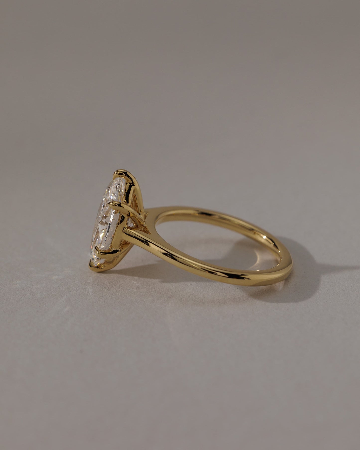 Leila - Marquise Claw Solitaire with Cathedral High Setting Engagement Ring - White Gold