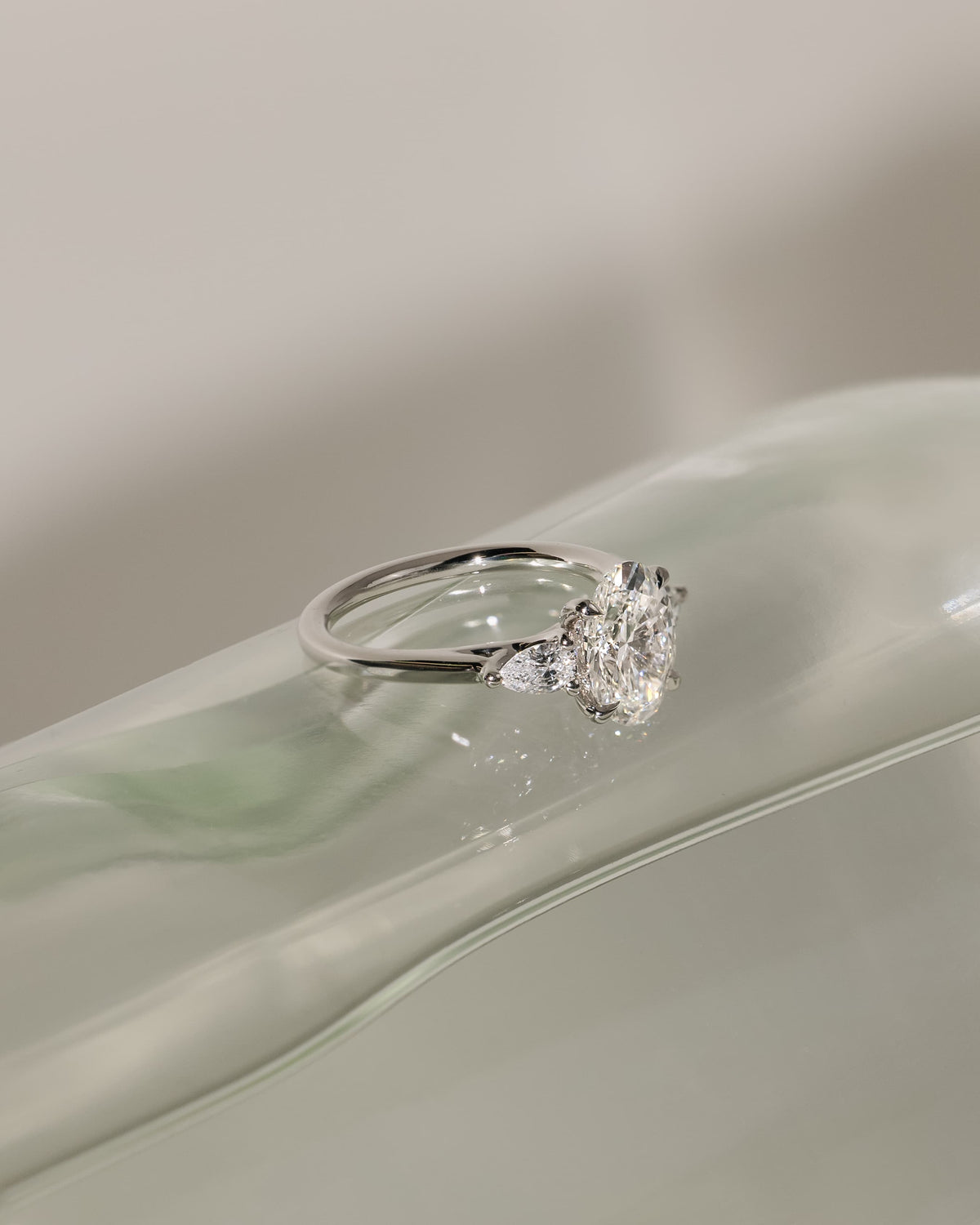 Amara - Oval Claw Trilogy with Pear Side Stones and Open Trellis Gallery Engagement Ring - Yellow Gold - yellow gold - Lara Jewels