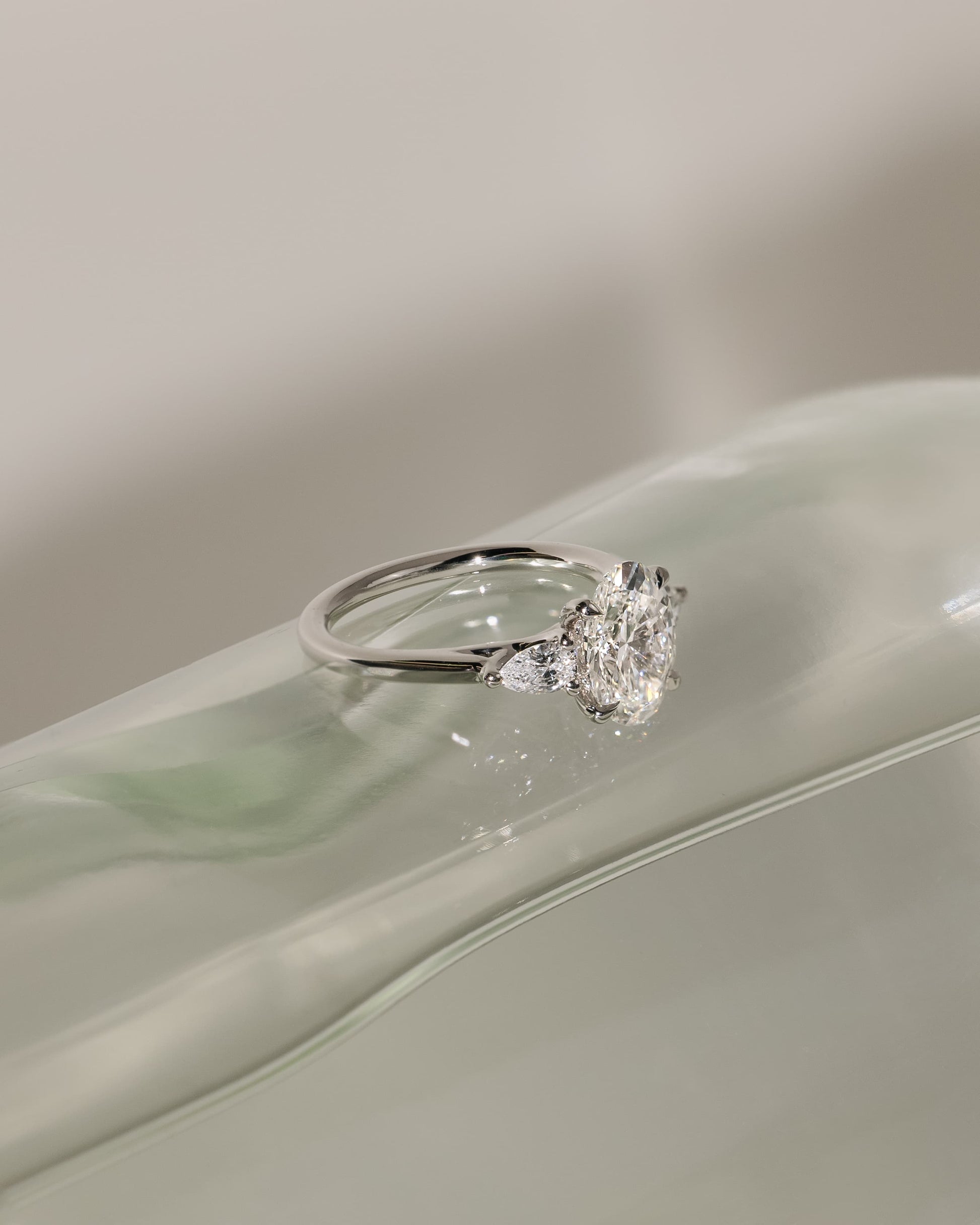 Amara - Oval Claw Trilogy with Pear Side Stones and Open Trellis Gallery Engagement Ring - White Gold - white gold - Lara Jewels