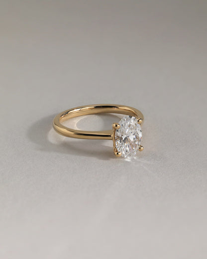 Emily - Oval Claw Solitaire with Pinched Tapered Band and Cathedral Low Setting Engagement Ring - White Gold