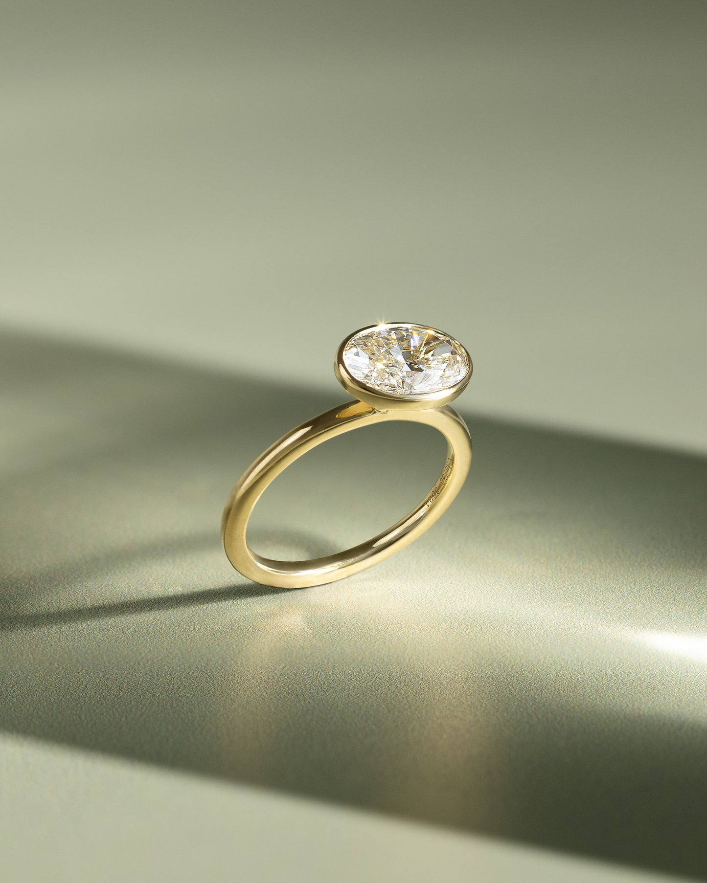 Erin - Oval East West Bezel Solitaire  Engagement Ring - Yellow Gold
