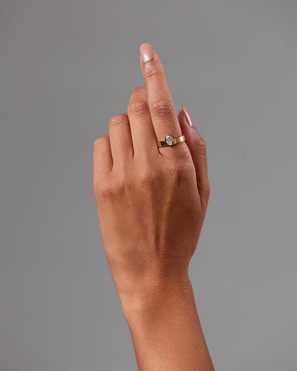Carmen - Oval Bezel Solitaire with Offset Setting and Flat Cigar Band Engagement Ring - Yellow Gold