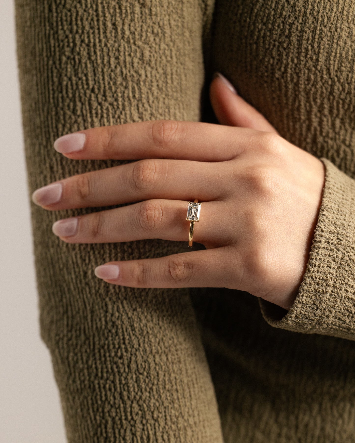 Evelyn - Emerald East West Claw Solitaire with Raised Basket Gallery Engagement Ring - Yellow Gold